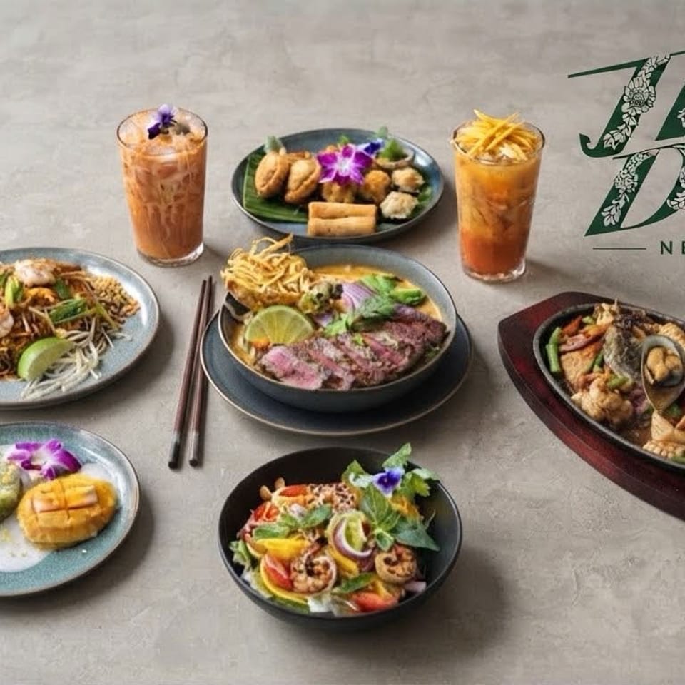 Thai food spread featuring noodles, curries, seafood, desserts, iced drinks, and floral garnishes beside Thai Diner New York logo.